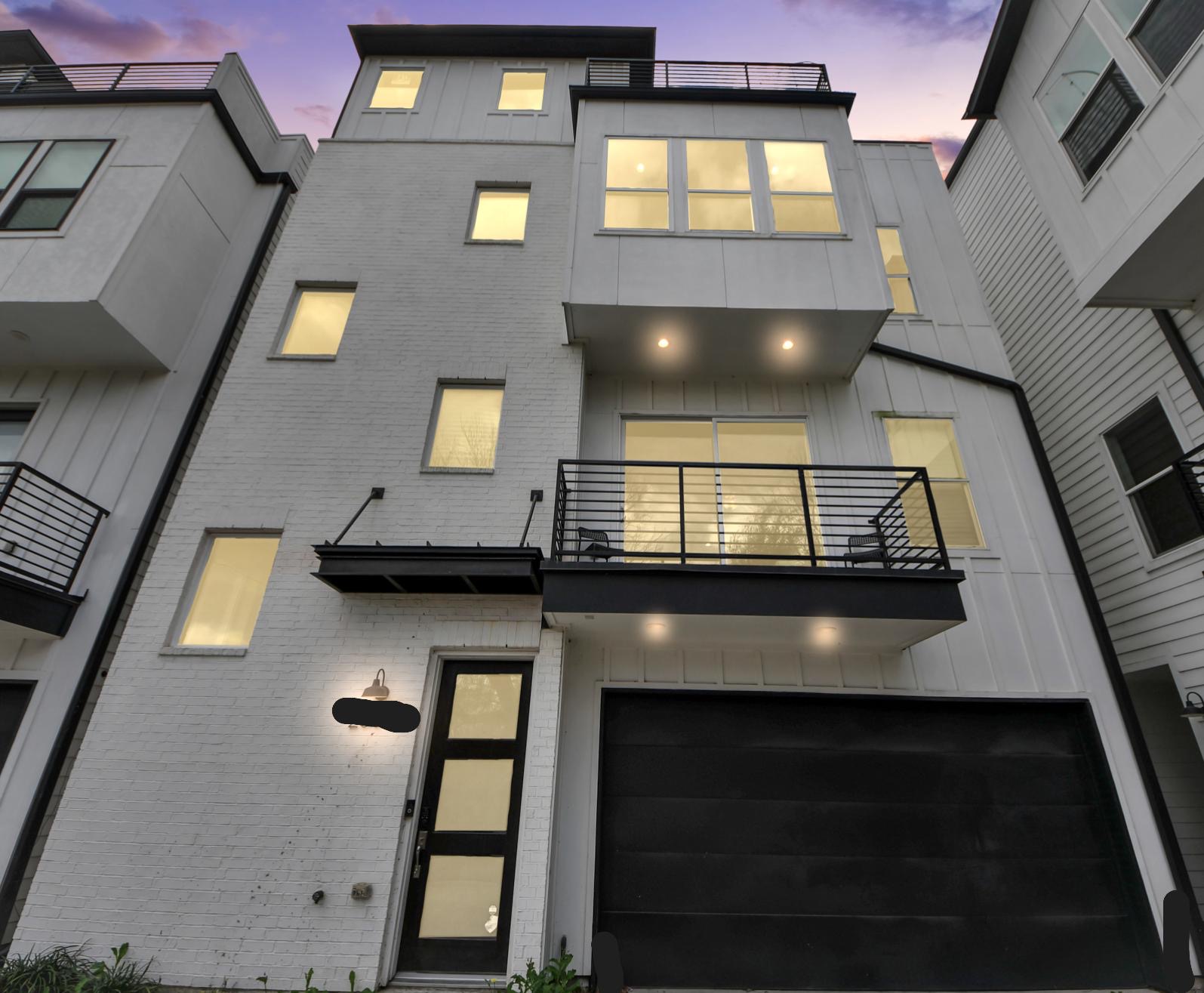 Exterior of Modern Home with Rooftop Patio — Houston TX short-term rental